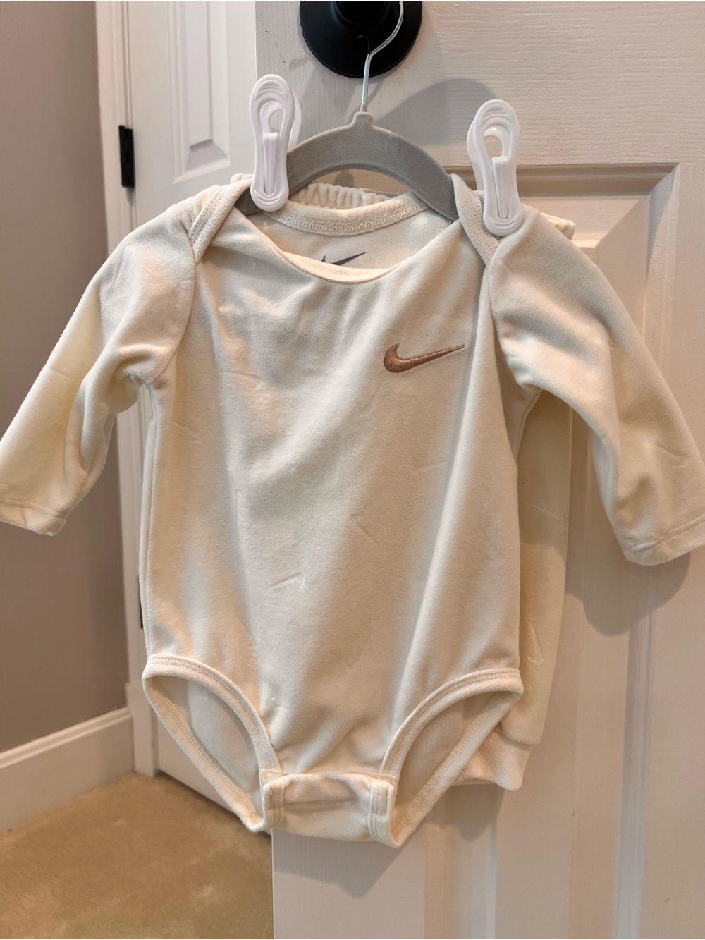 Nike Baby Cream Long-Sleeve One-Piece Bodysuit— velvety soft!